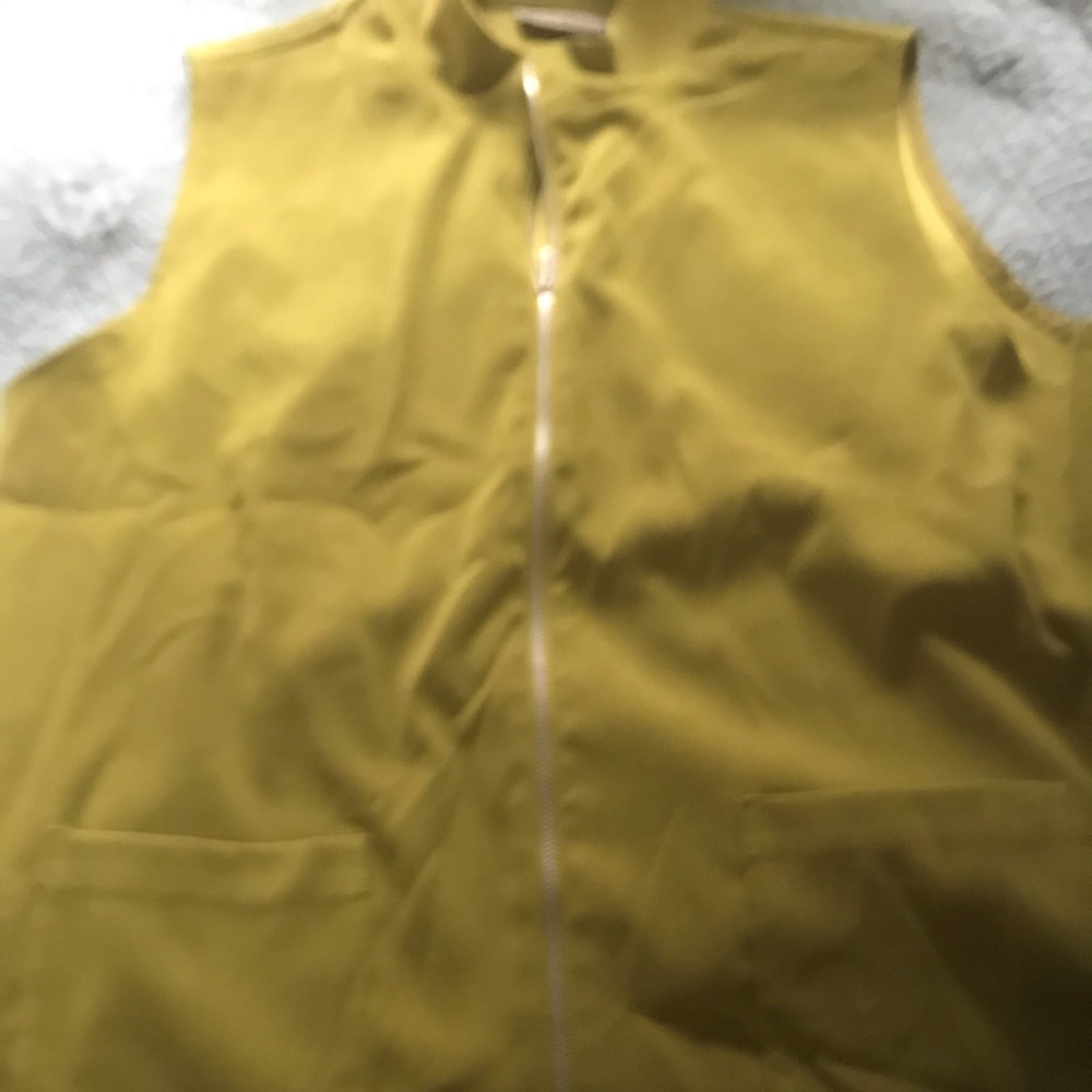 Bright green zip pocketed vest
